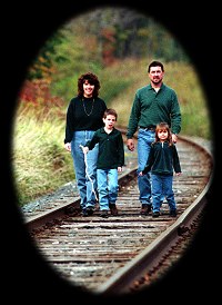 family on railroad tracks